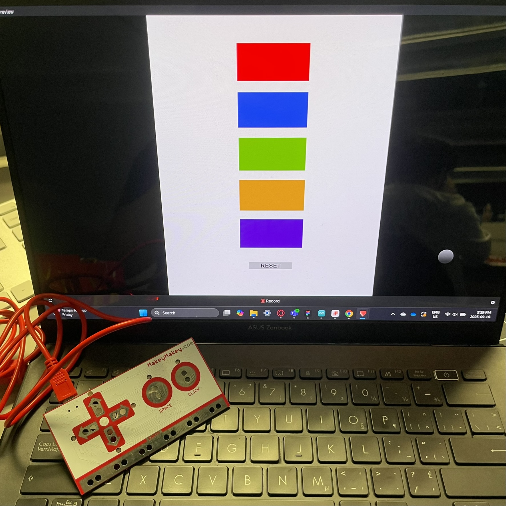 This is an image of the color button prototype that I connected with the Makey Makey board to actually change the colors on the screen. The board can be seen there on the bottom right, when I tapped the buttons the colors on the screen changed successfully.